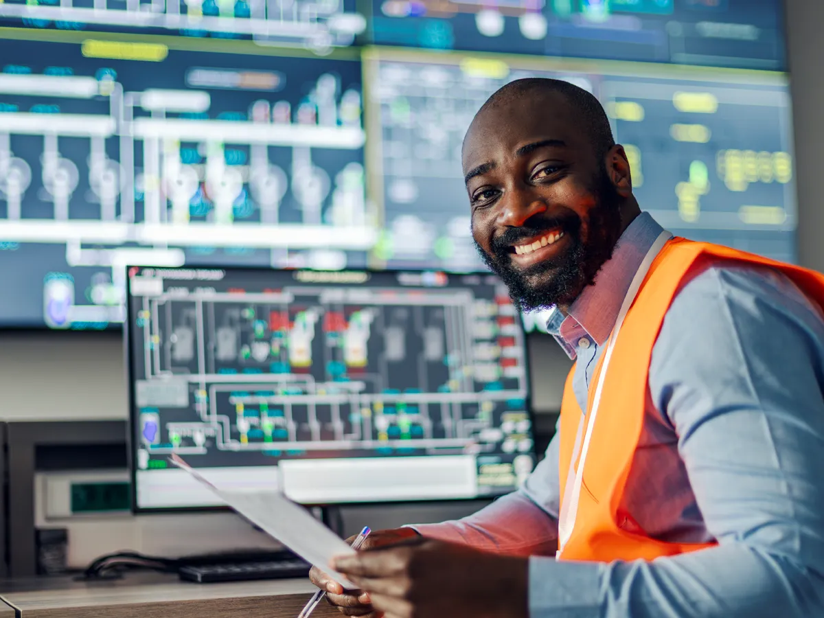 Engineer-safetyvest-controlroom-1200x900